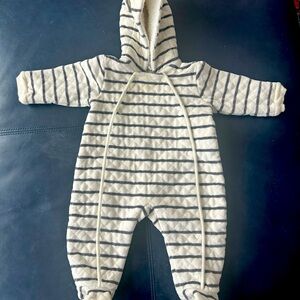 Bundle up your little one with this cozy cotton baby snowsuit.